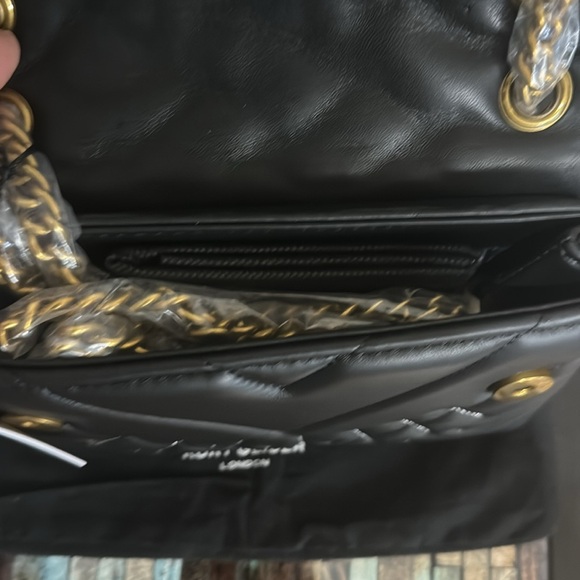 Kurt Geiger London
Mini Kensington Eye Crossbody Bag - Picture 12 of 15